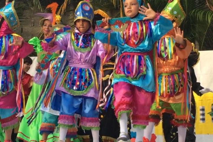a little girl posing for a picture