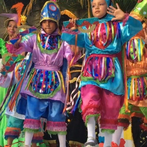 a little girl posing for a picture